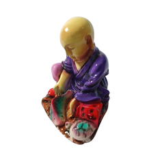 Shaolin sitting with a fish and turtle purple in resin 12 cm high