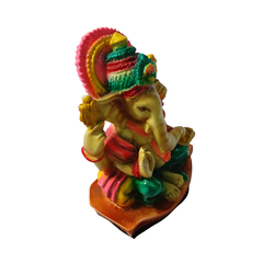Ganesha or elephant-headed deity orange in resin 11 cm high