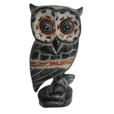 Owl on tree limb 30 cm