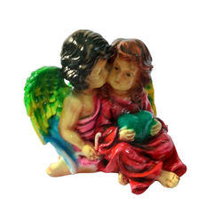 Angels x 2 sitting close in resin 16 cm high