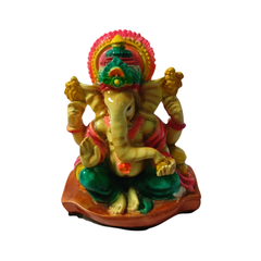 Ganesha or elephant-headed deity orange in resin 11 cm high