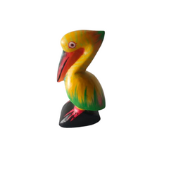 Pelicans squatting on rocks yellow 15 cm